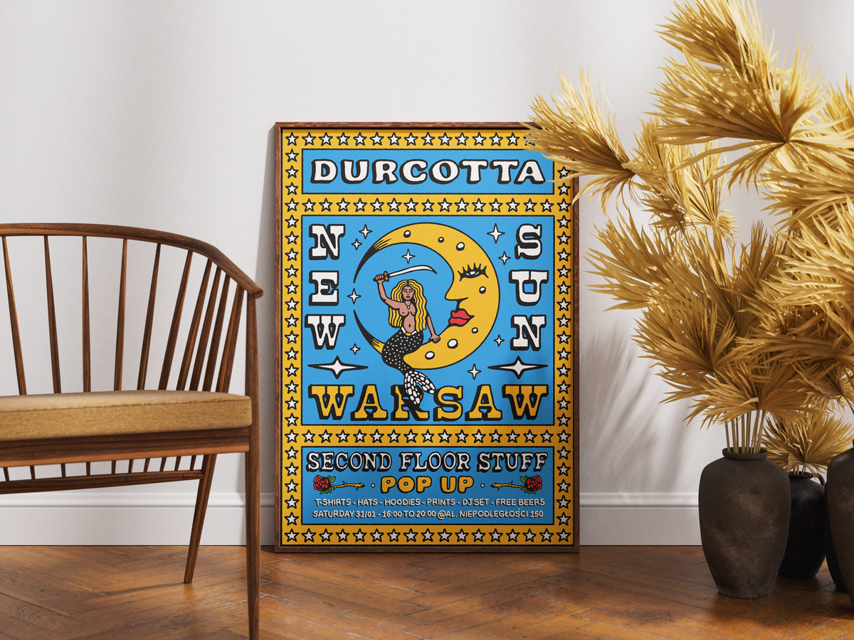 A colorful vintage-style poster leaning against a white wall on a wooden floor, next to a wooden chair and potted dried palm branches. The poster reads 'DURCOTTA NEW SUN SAW WARSAW SECOND FLOOR STUFF POP UP with illustrated text and a crescent moon.